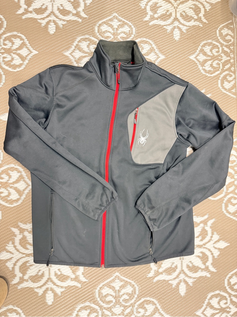 Spyder Men's Black Jacket with Gray Chest Panel and Red Zipper